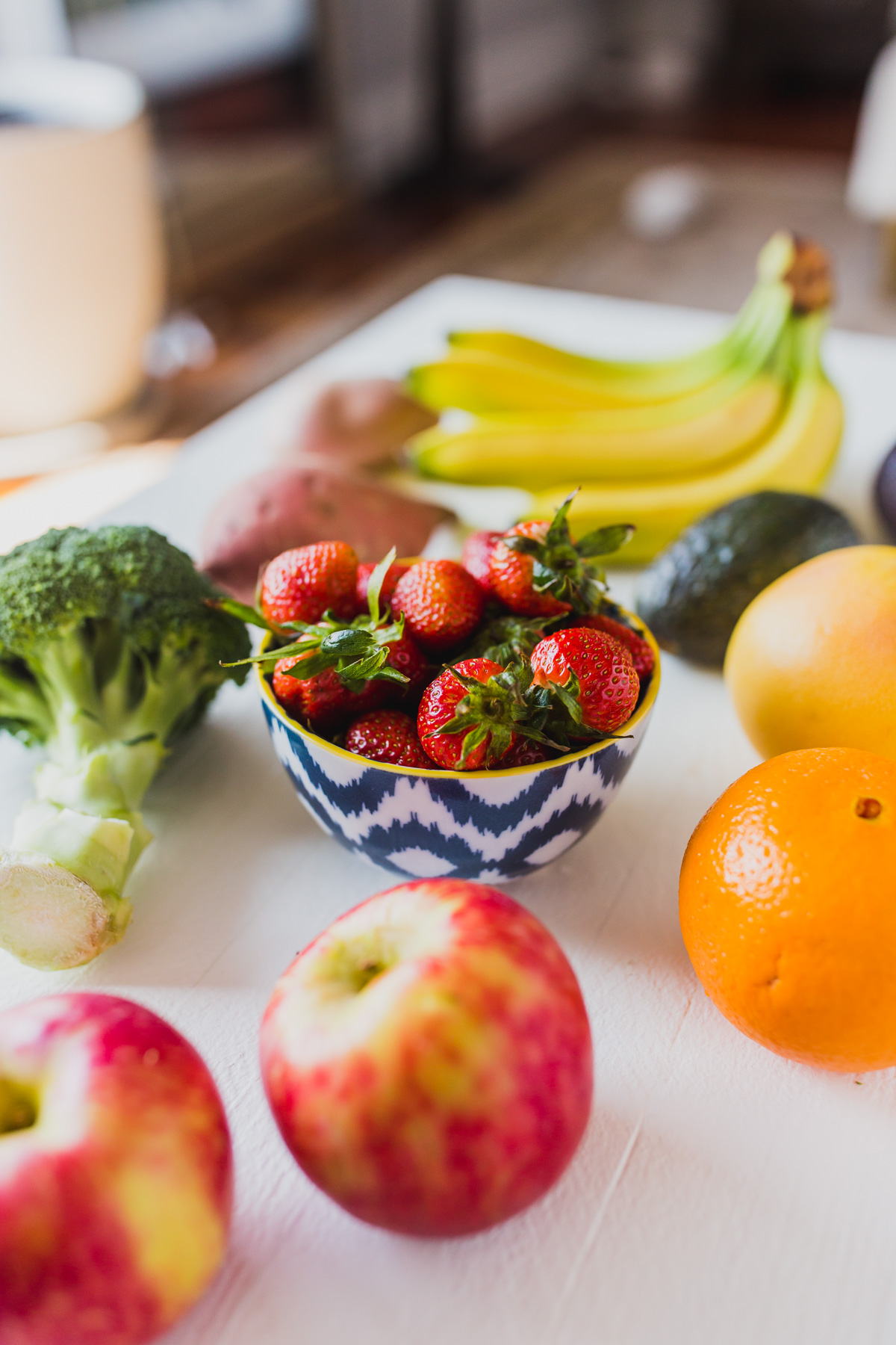 Wondering how to properly wash produce? You can use a simple homemade fruit and vegetable wash or DIY produce spray to quickly and effectively remove germs, dirt and pesticides from your conventional or organic produce. Click through for more non-toxic living tips and the recipe for my natural fruit and veggie wash, both are perfect for natural living for beginners! #naturalliving #nontoxicliving #cleanliving #healthyliving