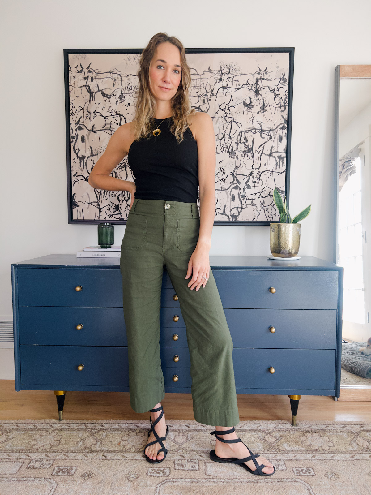 black tank and olive green pants