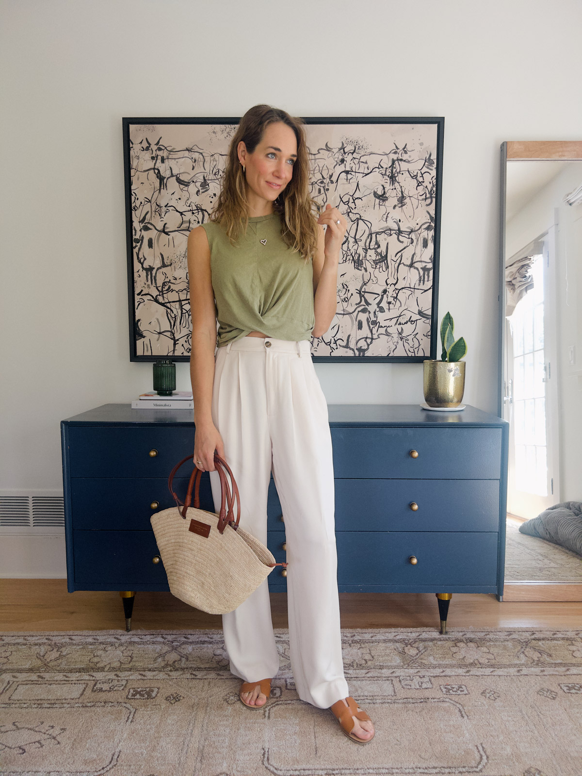 white pants outfit with green shirt