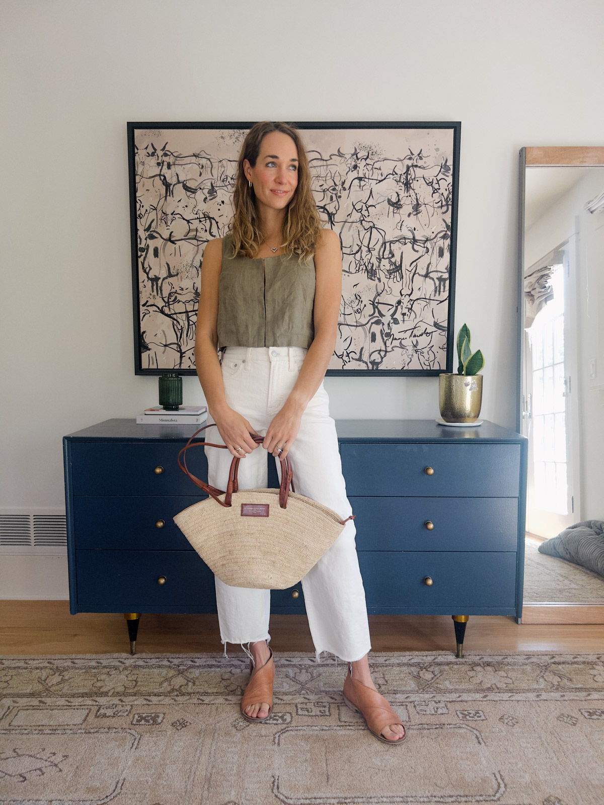 white pants outfit with linen vest